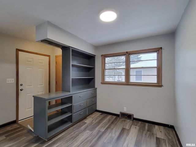 bedroom with wood-type flooring