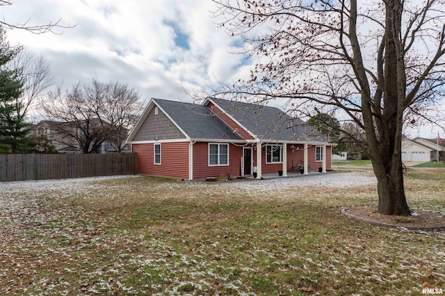 view of front of home featuring a front yard