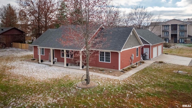 exterior space featuring a yard and a garage