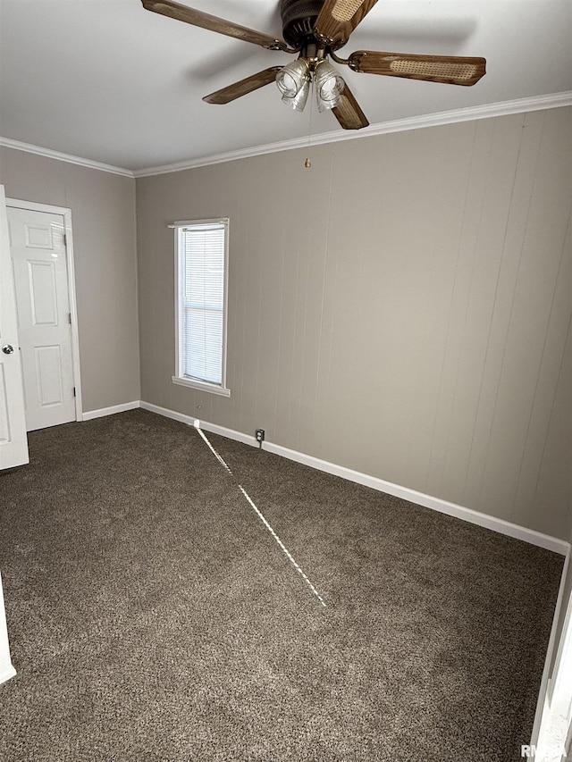 carpeted empty room featuring ornamental molding