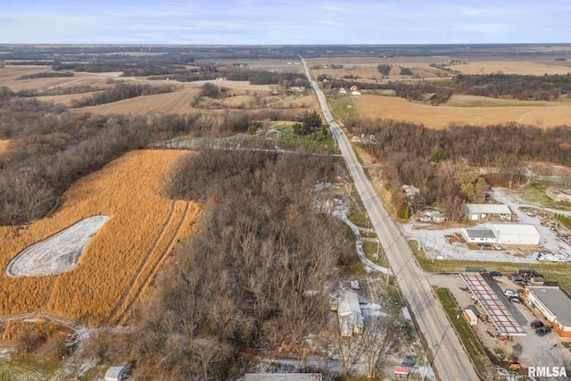 birds eye view of property featuring a rural view