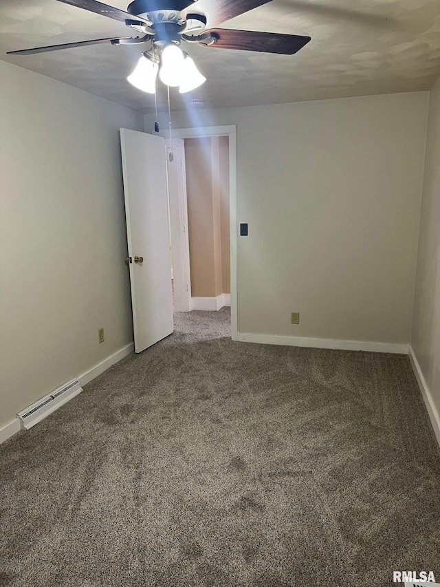 unfurnished room with carpet and ceiling fan