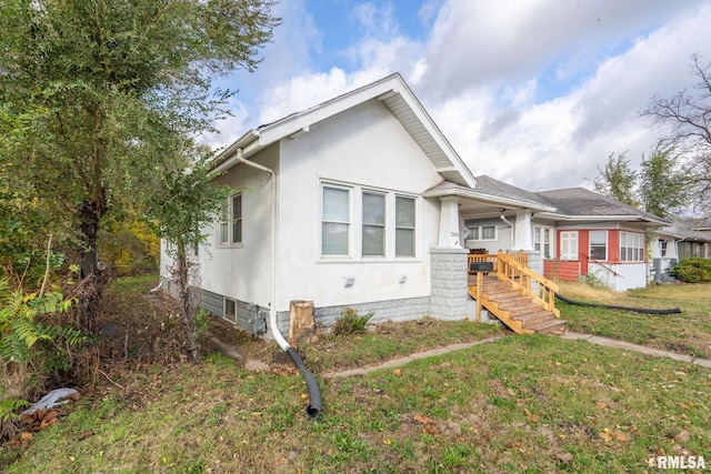 view of front of home with a front yard