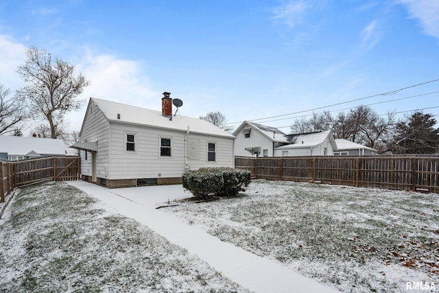 view of snow covered property