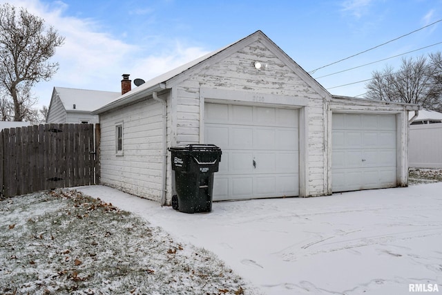 view of snow covered garage