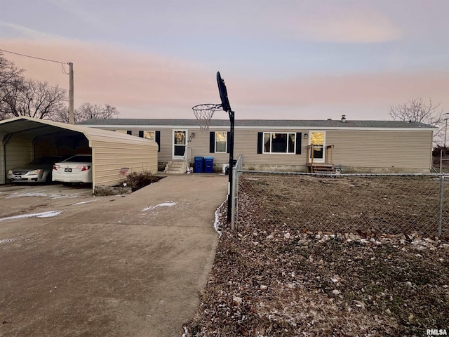 view of front of property with a carport