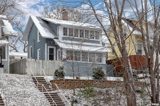 view of snow covered property