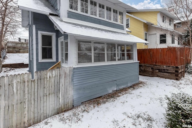 view of snow covered property