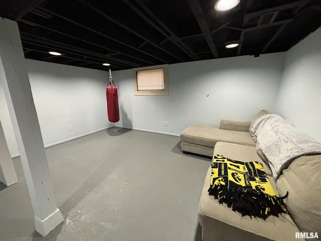 living room featuring concrete flooring