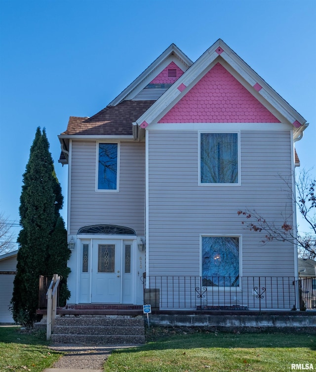 view of front of house with a front yard