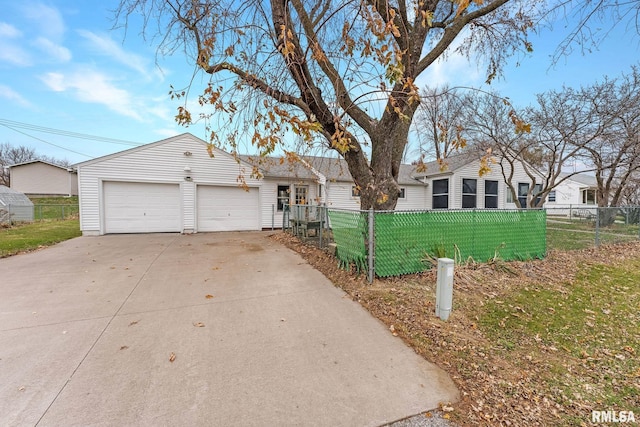 ranch-style home with a garage