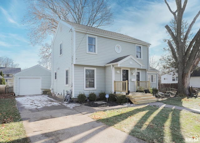 view of front of house featuring an outbuilding, a garage, and a front lawn