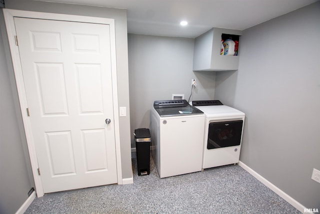 washroom with washing machine and clothes dryer, laundry area, recessed lighting, and baseboards