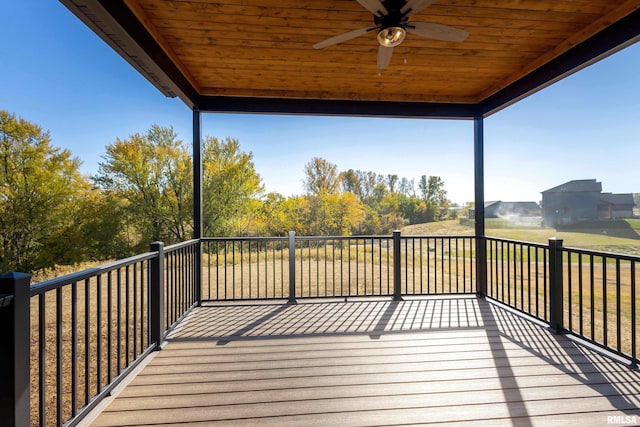 wooden deck with ceiling fan