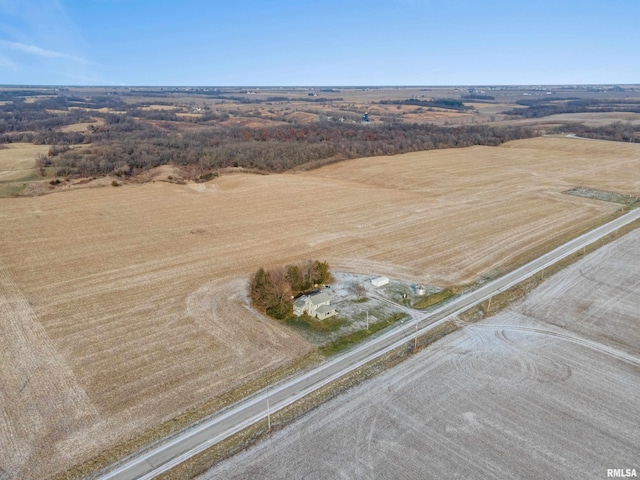 birds eye view of property with a rural view