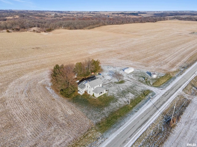 birds eye view of property with a rural view