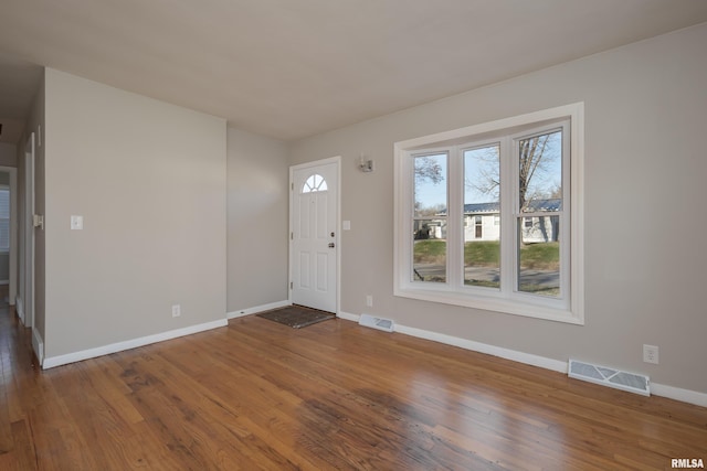 entrance foyer with hardwood / wood-style floors