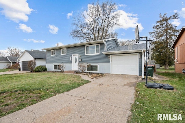 raised ranch featuring a garage and a front yard