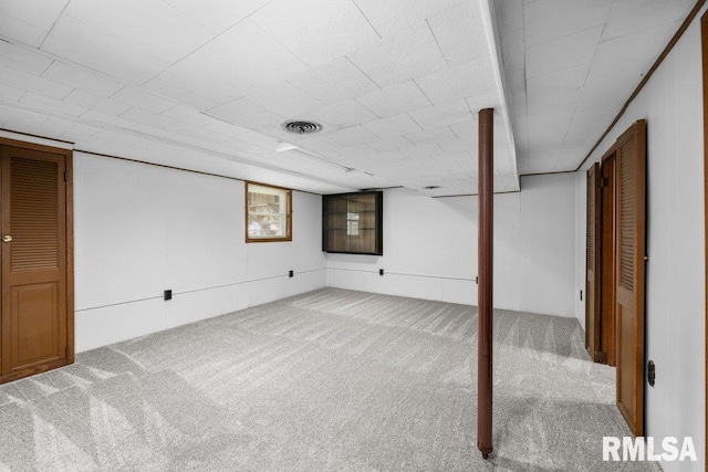 basement featuring carpet flooring