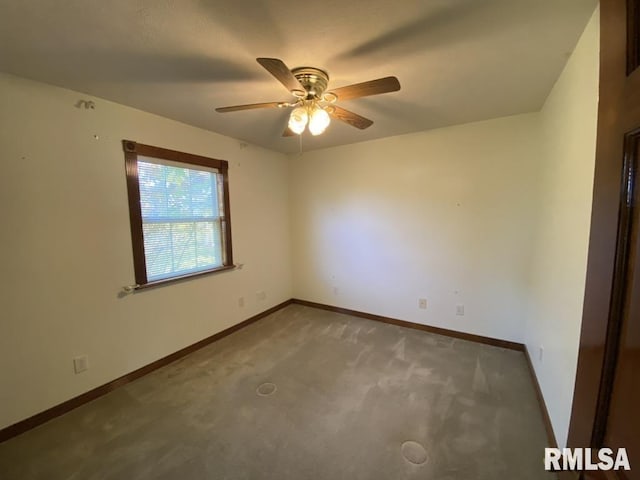 spare room with carpet flooring and ceiling fan