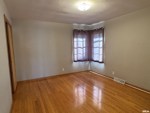 empty room featuring light hardwood / wood-style floors