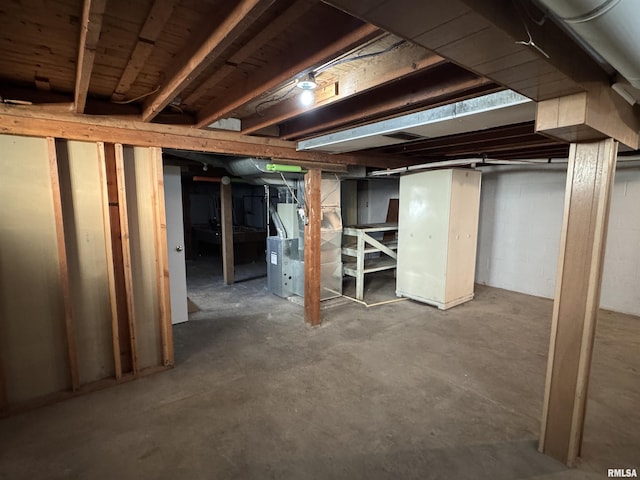 basement featuring heating unit