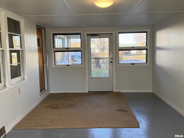 entryway featuring a drop ceiling