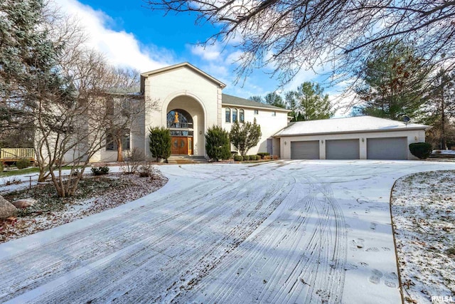 view of front of home with a garage