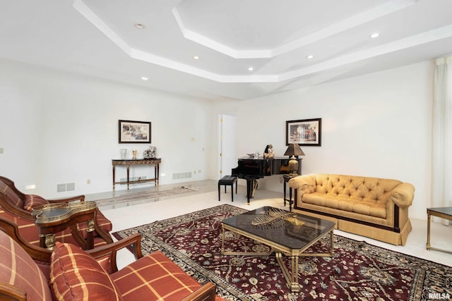 living room with a tray ceiling