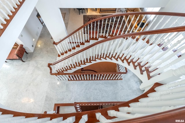 stairs with a towering ceiling