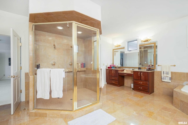 bathroom featuring tile patterned floors, vanity, and plus walk in shower