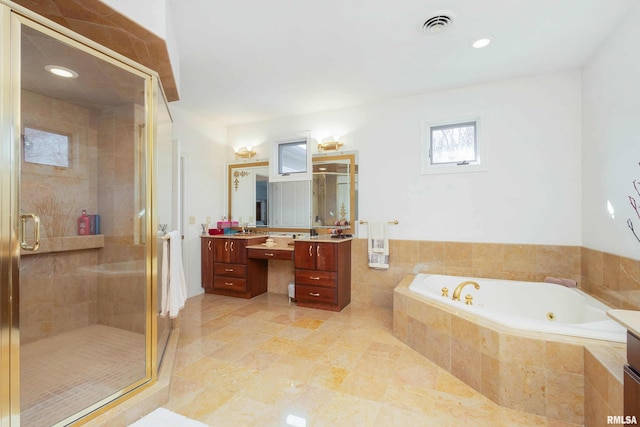 bathroom featuring separate shower and tub, tile patterned floors, and vanity