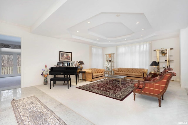 living room with a tray ceiling