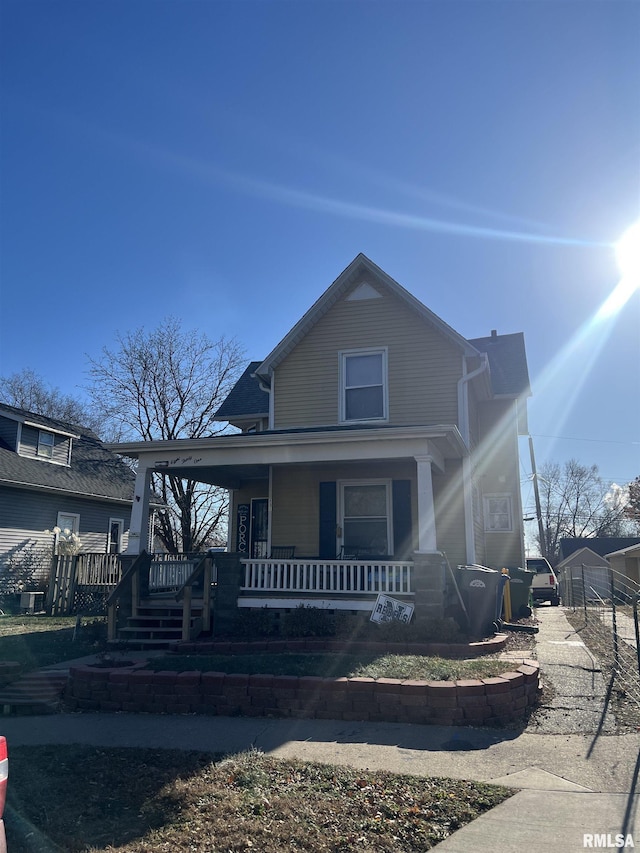 view of front of home featuring covered porch