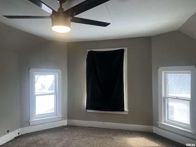 bonus room featuring a ceiling fan, carpet, vaulted ceiling, and baseboards