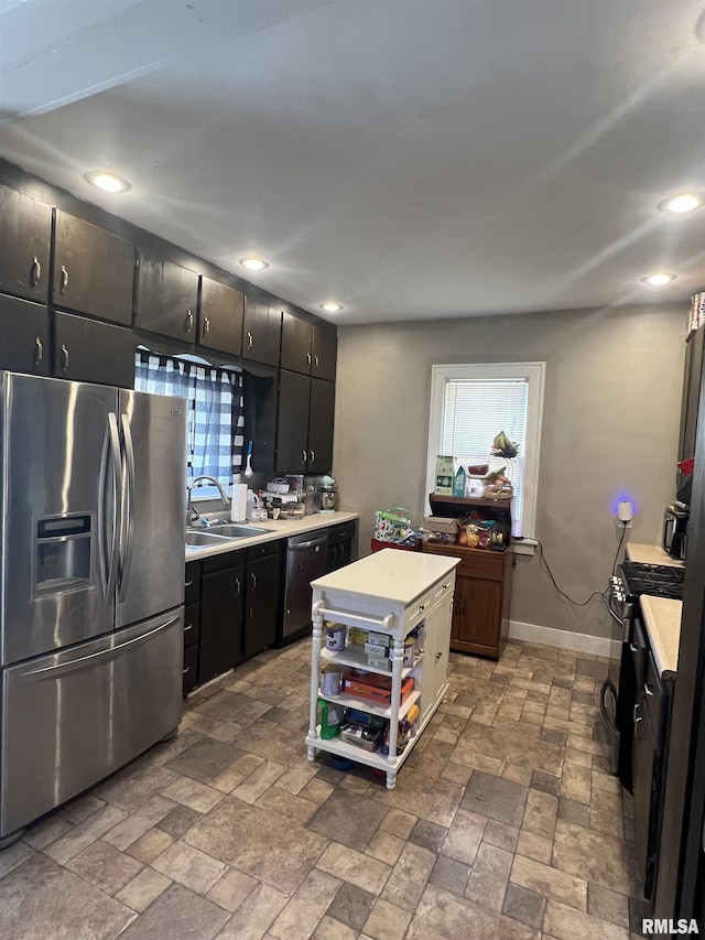 kitchen with appliances with stainless steel finishes and sink