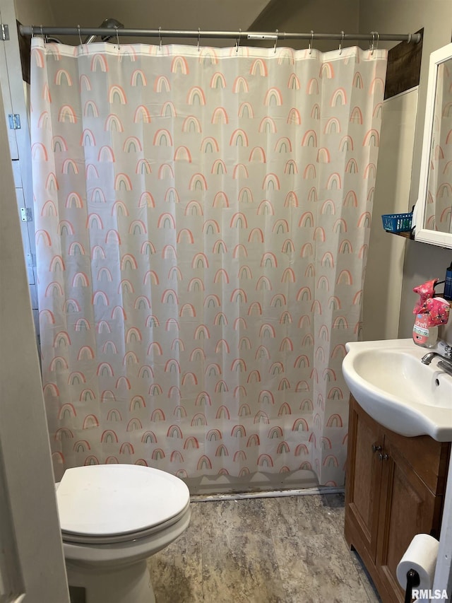 full bathroom featuring vanity, toilet, and shower / bath combo with shower curtain