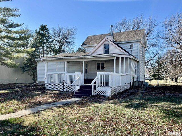 1812 E 1650th St, Paloma, IL 62359 - view of front of home featuring covered porch and a front yard