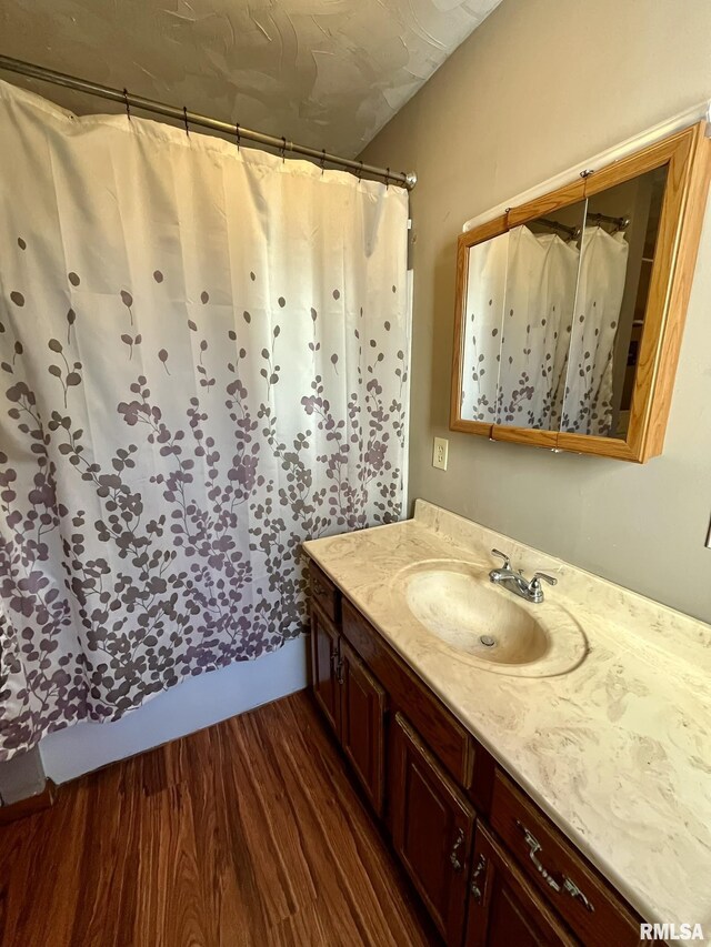 1812 E 1650th St, Paloma, IL 62359 - bathroom with vanity and wood-type flooring