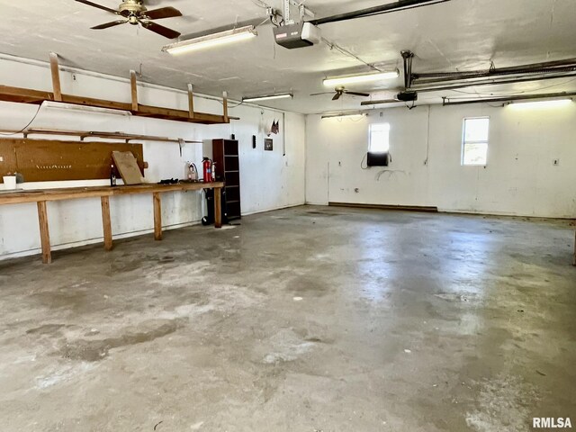 1812 E 1650th St, Paloma, IL 62359 - garage with a workshop area and a garage door opener