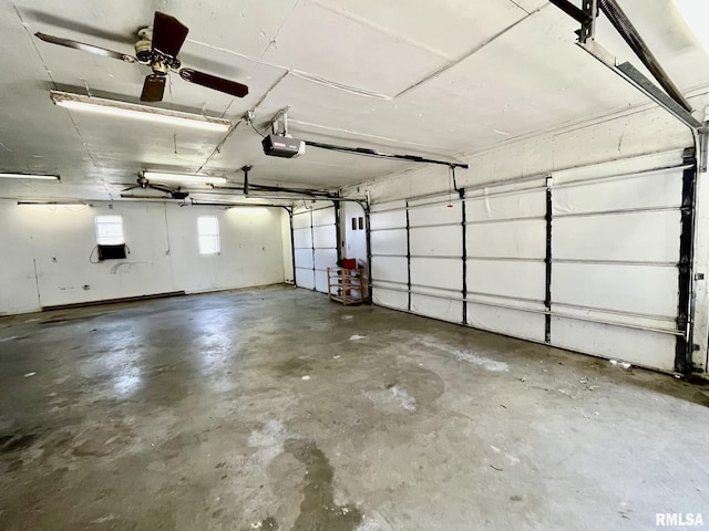1812 E 1650th St, Paloma, IL 62359 - garage with ceiling fan and a garage door opener