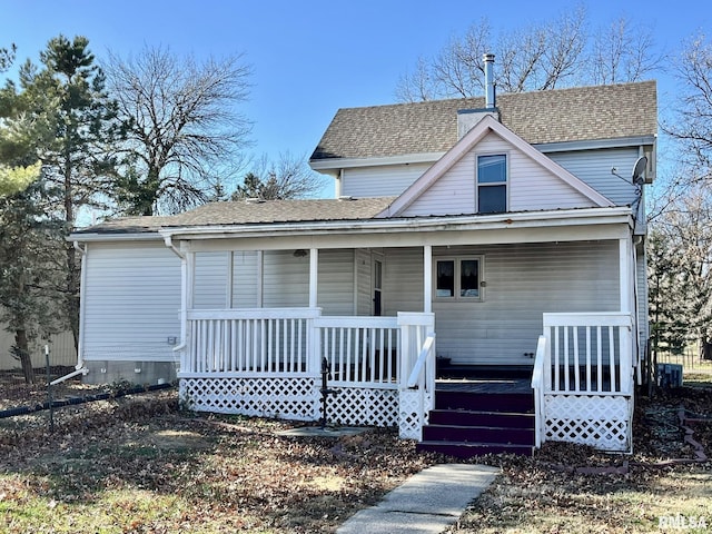 1812 E 1650th St, Paloma, IL 62359 - view of front facade with covered porch and central AC unit