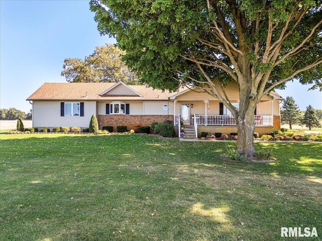 view of front of house with a porch and a front yard