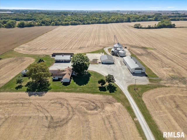 birds eye view of property with a rural view