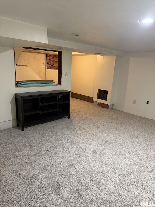 basement featuring carpet