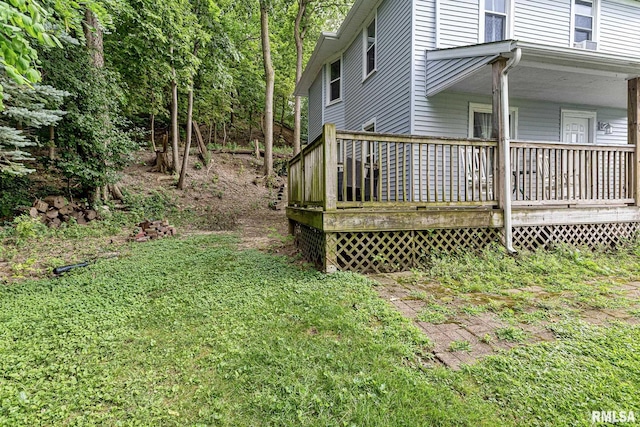 view of yard with a wooden deck