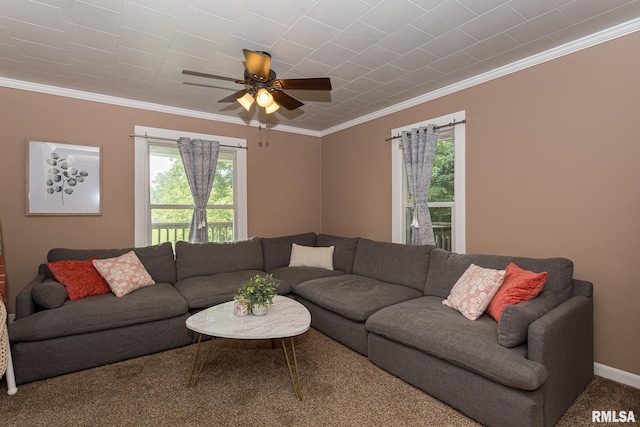 carpeted living room featuring ceiling fan and ornamental molding