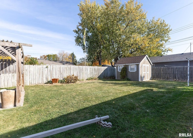 view of yard with a storage shed