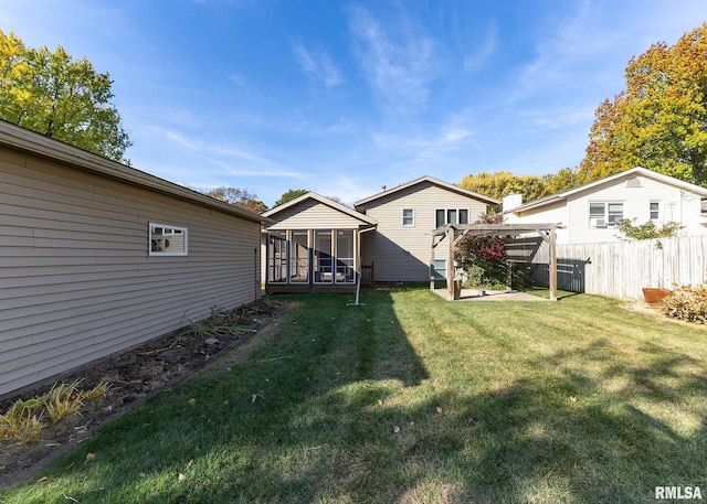 view of yard with a sunroom