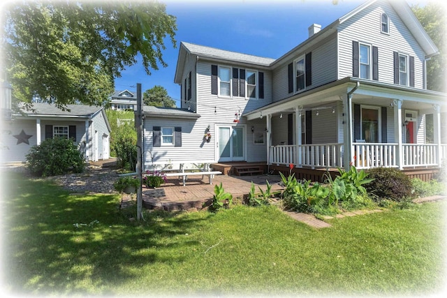 view of front of home with a front lawn and a porch